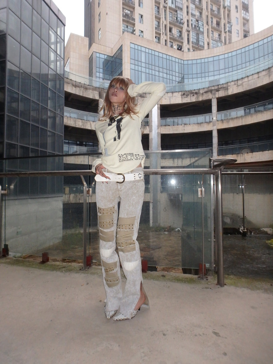 "Unfinished finish"special-shaped rivet broken jeans