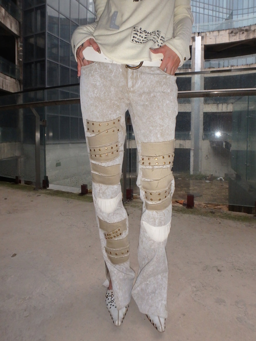 "Unfinished finish"special-shaped rivet broken jeans