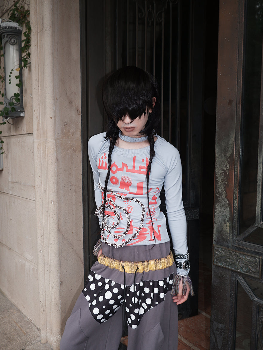 "WORLD SEEN WHILE SWIMMING" asymmetrical long sleeve