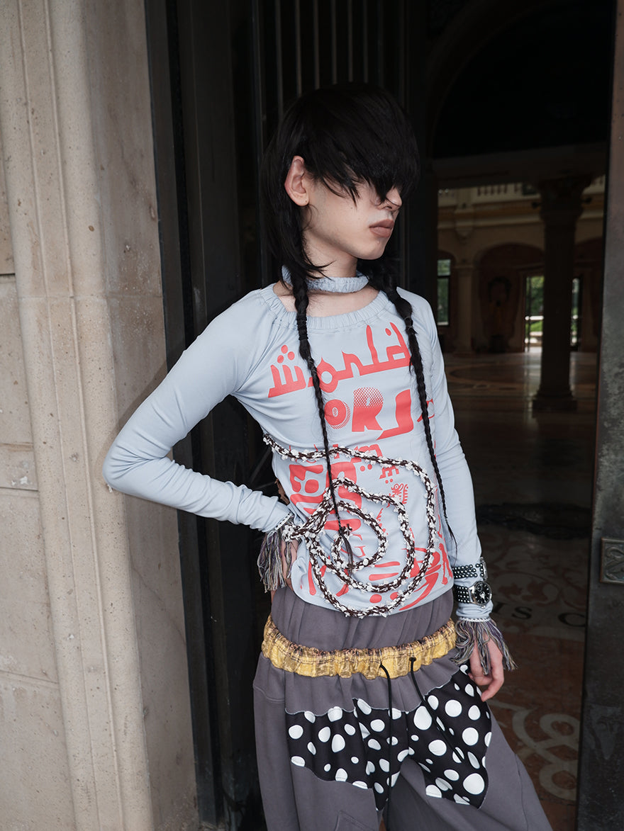 "WORLD SEEN WHILE SWIMMING" asymmetrical long sleeve