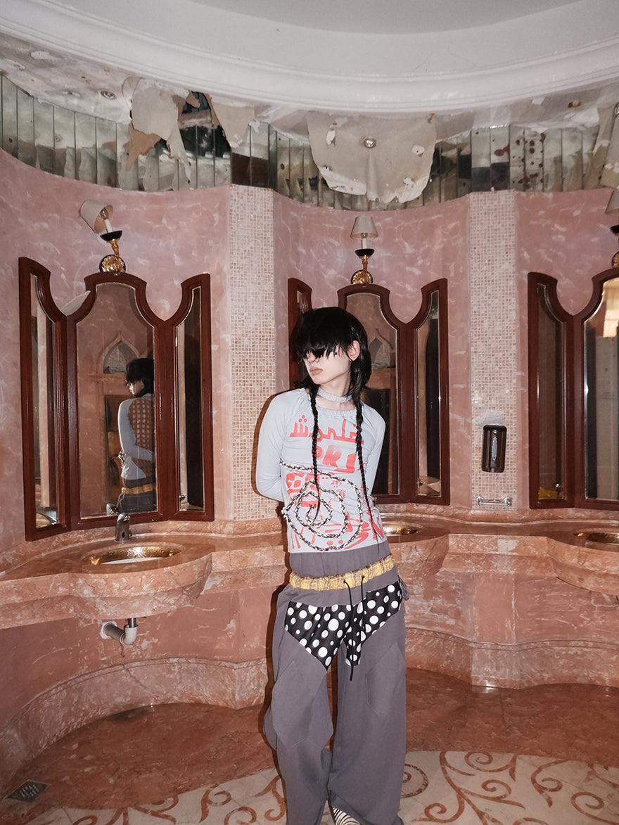 "WORLD SEEN WHILE SWIMMING" asymmetrical long sleeve