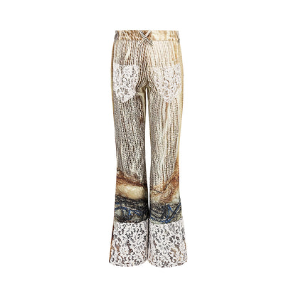 printed spider web distressed patchwork flared trousers