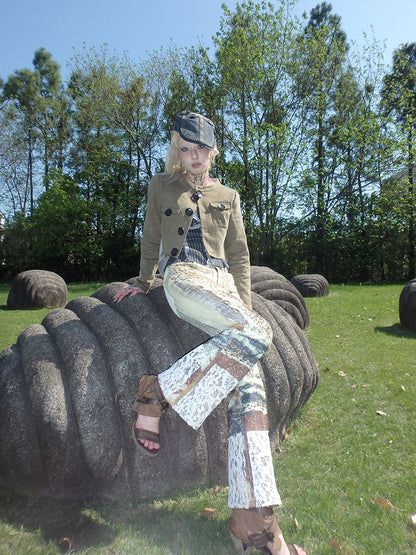 printed spider web distressed patchwork flared trousers