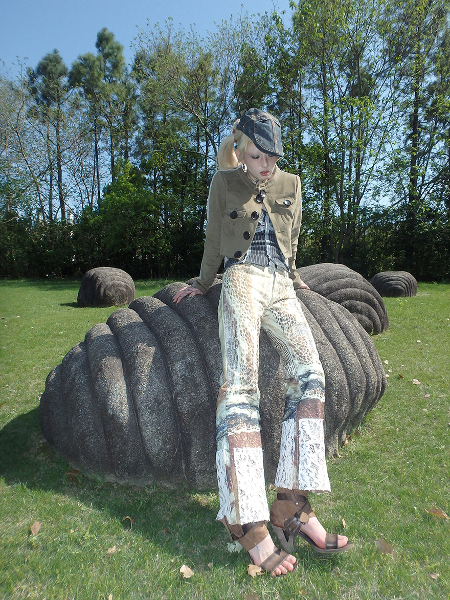 printed spider web distressed patchwork flared trousers