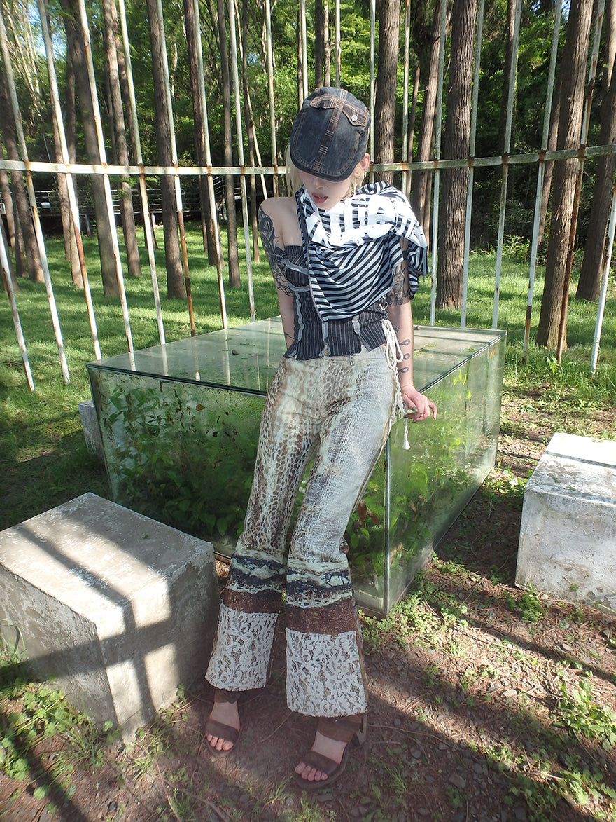 printed spider web distressed patchwork flared trousers