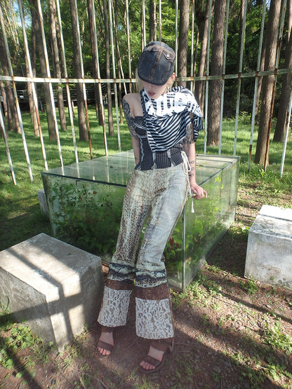 printed spider web distressed patchwork flared trousers