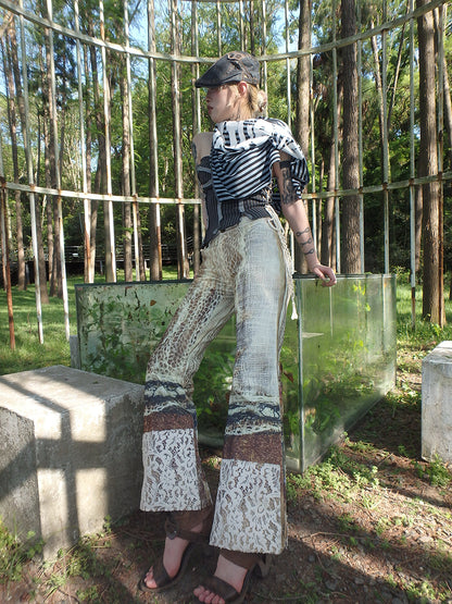 printed spider web distressed patchwork flared trousers