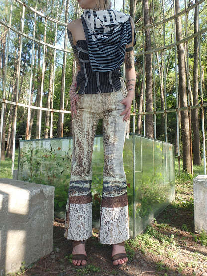 printed spider web distressed patchwork flared trousers