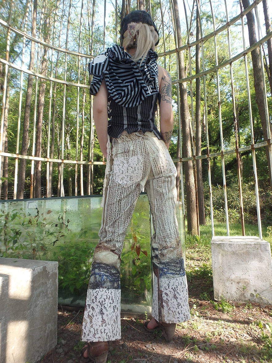 printed spider web distressed patchwork flared trousers