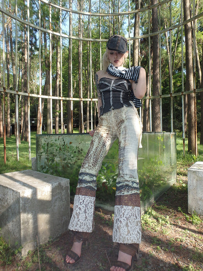 printed spider web distressed patchwork flared trousers